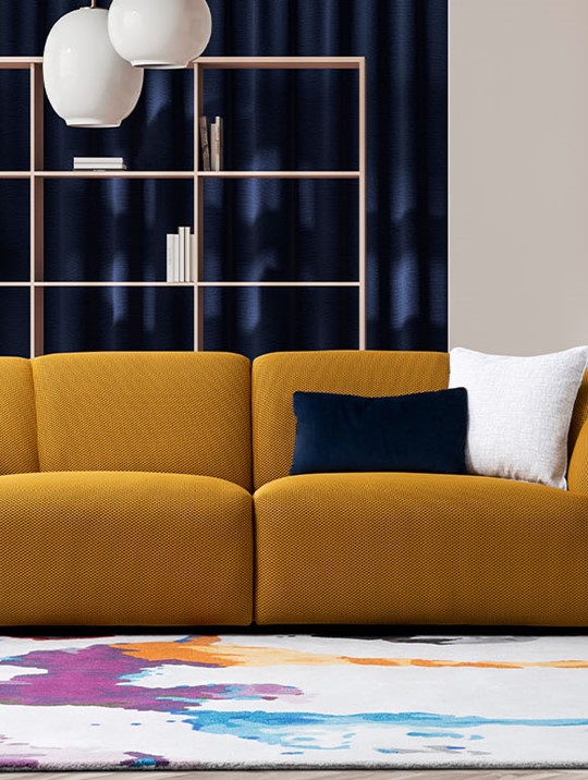Mustard yellow flynn 2 seater sofa in a colourful living