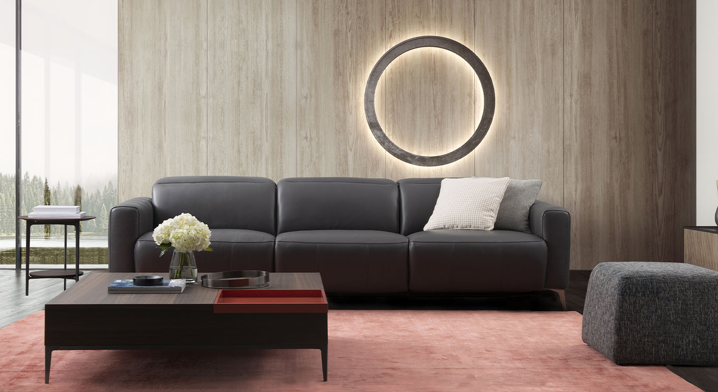 grey leather fabbrica 3 seater sofa in a modern livingroom