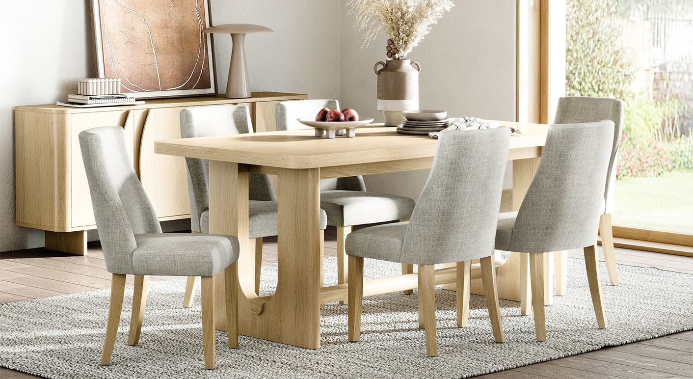 Camden light oak dining set featuring the matching sideboard in a bright neutral dining room