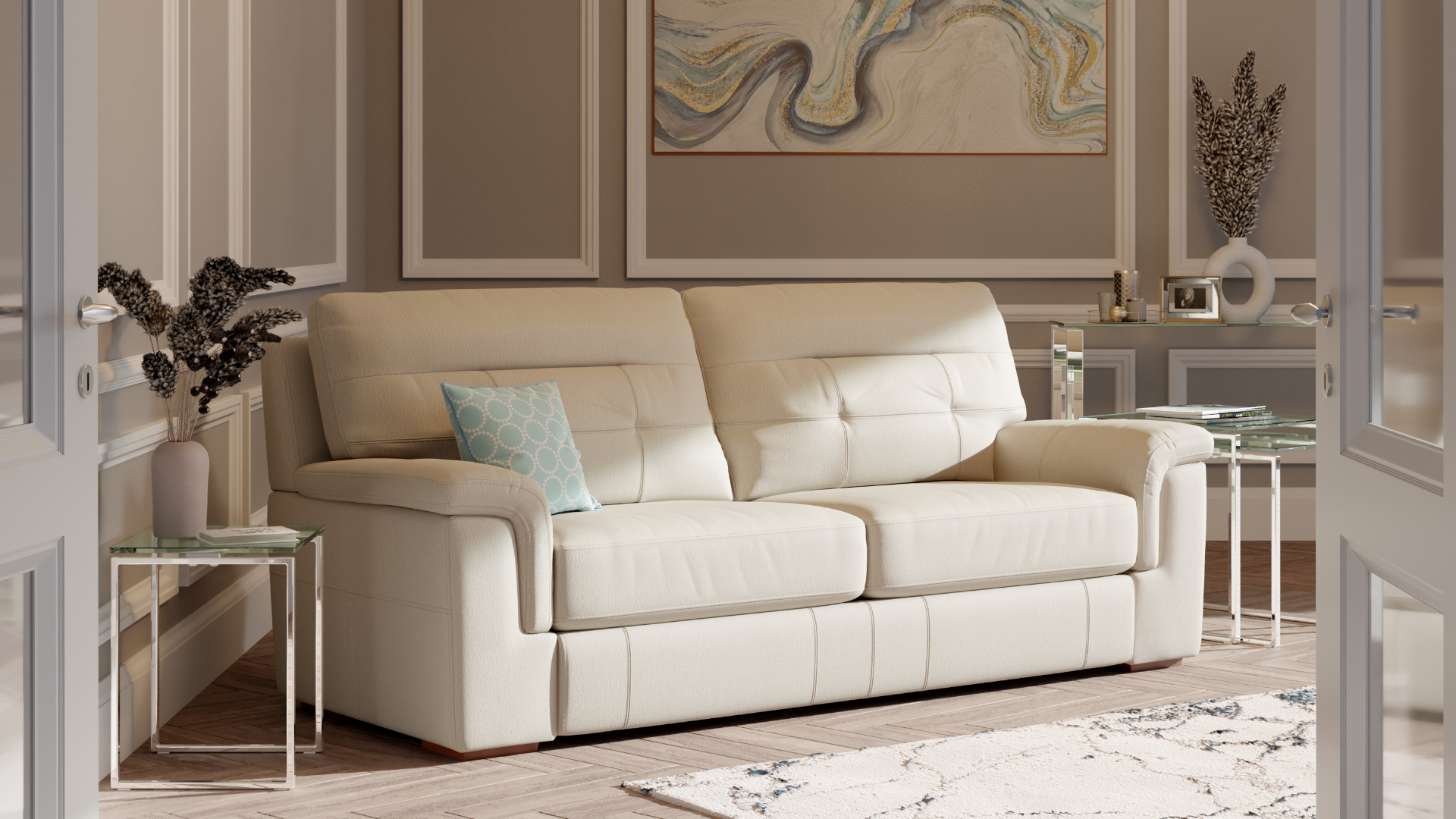 Cream leather sofa shown in a stylish, bright living room with light brown walls and a beige rug