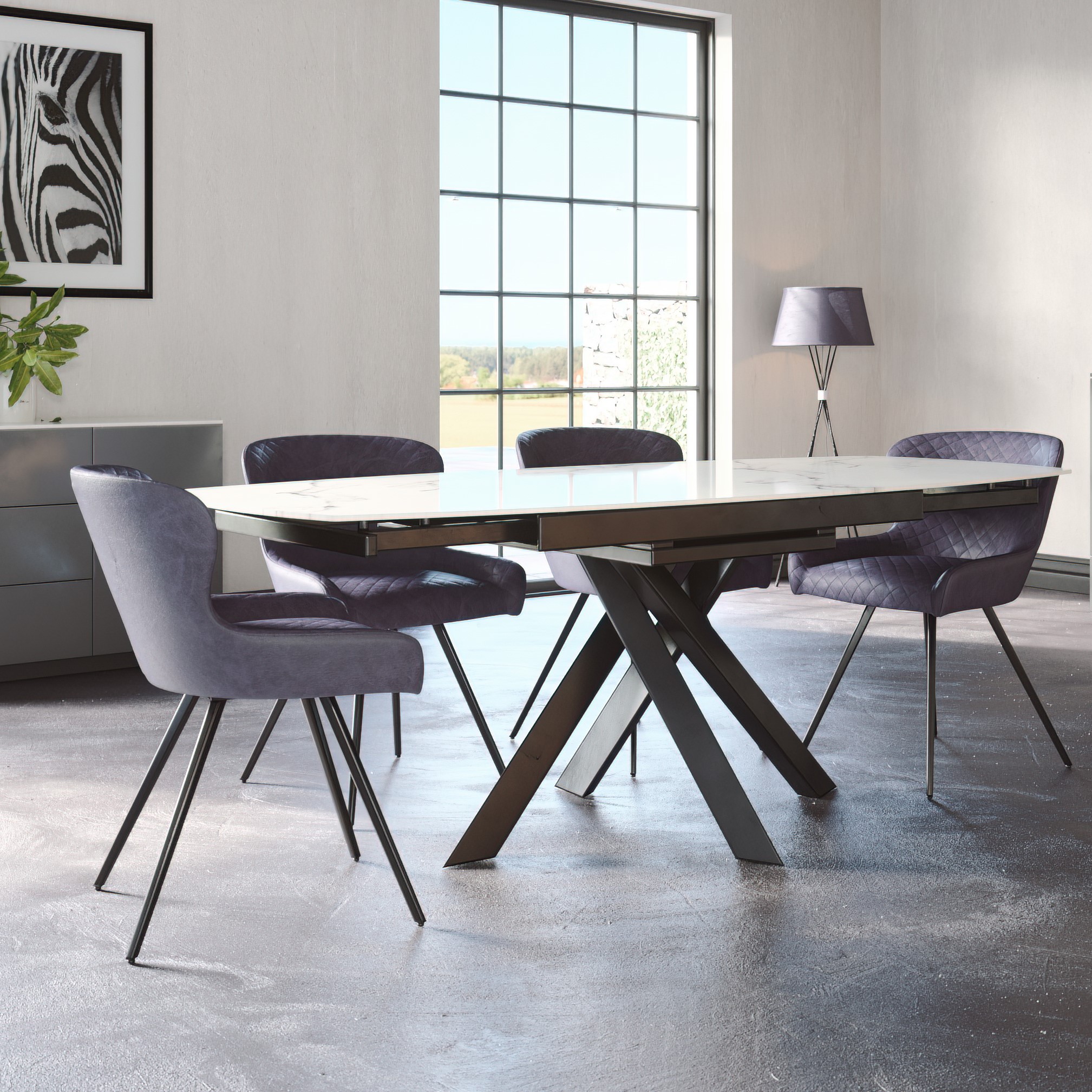 Avalon Dining set including 4 dark blue leather chairs and dining table in a modern setting