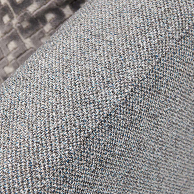 A close up image of a Chilton sofa arm, showing the texture of the fabric in a bluish grey colour.