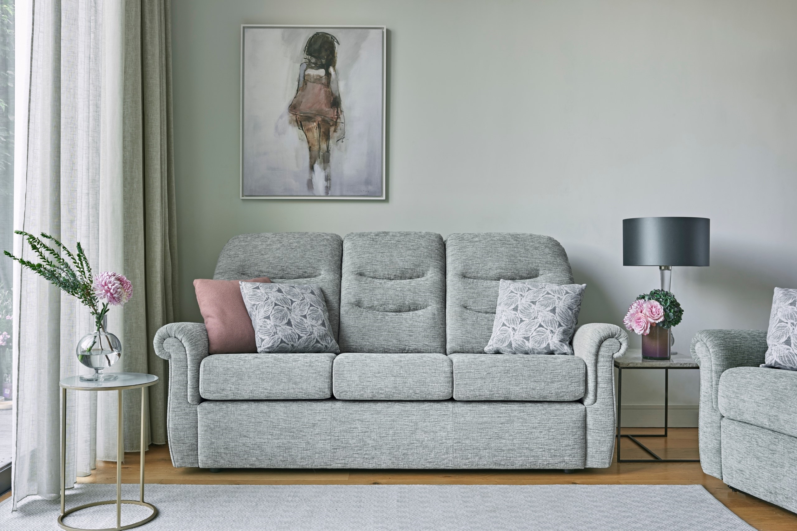 Grey fabric holmes 3 seater sofa in a grey decorated livingroom