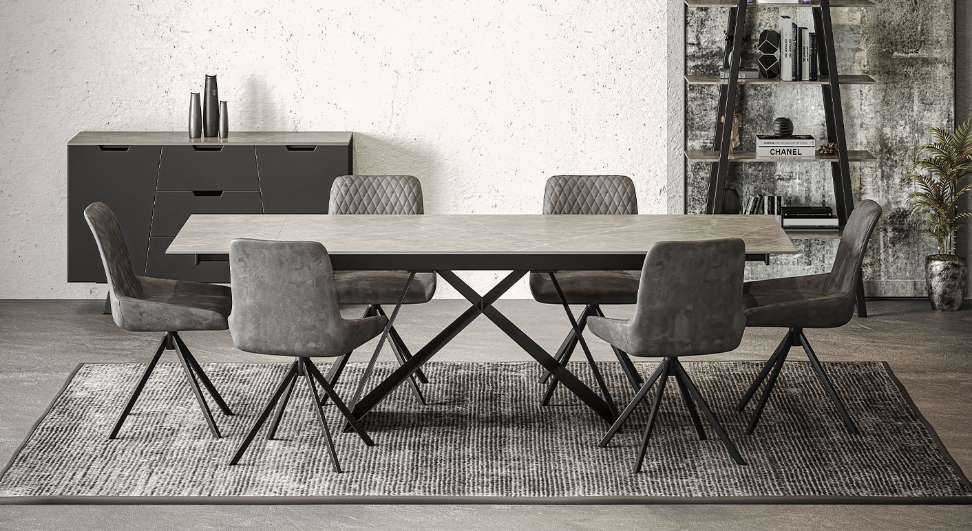 odessey dining set with 6 grey fabric chairs and grey large dining table in a grey decorated dining room